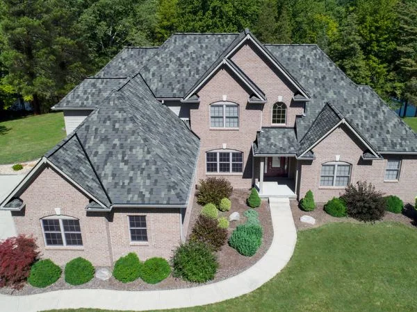 A home roofed in Storm Grey architectural shingles